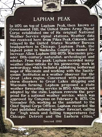A historical marker describing the history of Laphar Peak weather observatory.