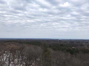 View looking east from the top of the Lapham Peak observatory tower at gentle landscape of Wisconsin.