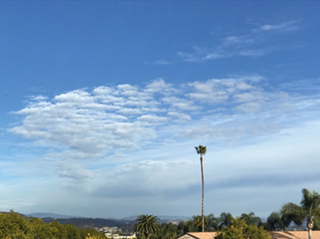 low-level stratus and mid-level cumulus clouds