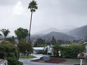 Rain falling from stratus clouds (nimbostratus) over San Marcos, CA