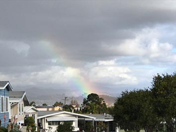 A full-spectrum partial rainbow beneath acumulonimbus cloud over San Marcos, CA