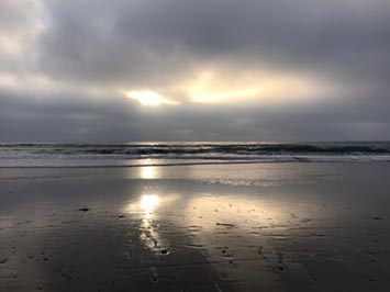 A stratus marine layer moving in on a sea breeze at the Del Mar Dog Beach, CA