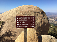 Sign showing distances to the summit and Lake Poway Park.