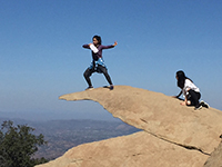Performers performing on Potato Chip Rock.