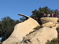People waiting in line to get onto Potato Chip Rock.