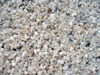 Beach sand rich in quartz grains