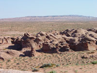 Wind-abraided outcrops of Navajo Sandstone on the Navajo Reservation