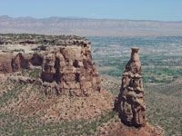 Escarpments of Cretaceous sedimentary rocks in Colorado National Monument and the Colorado River Valley near Grand Junction, Colorado.
