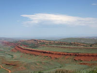 Redbeds of the Triassic Chugwater Formation on the northern flank of the Wind River Mountains near Lander, Wyoming.