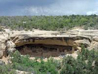 Ancient Anasazi cliff dwellings in overhanging Cretaceous-age sedimentary rocks in Mesa Verde National Monument, Colorado