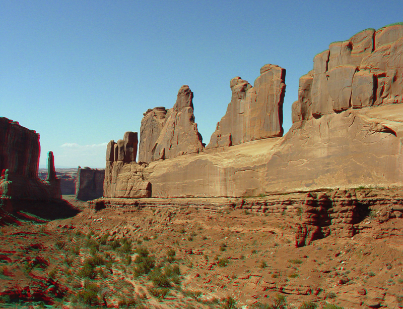 Walls of Entrada Sandstone border Park Avenue Canyon in the Courthouse Towers area.