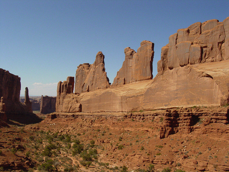 Walls of Entrada Sandstone border Park Avenue Canyon in the Courthouse Towers area.