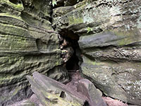 A narrow entrance connects the chasm area to the Ledges Trail.