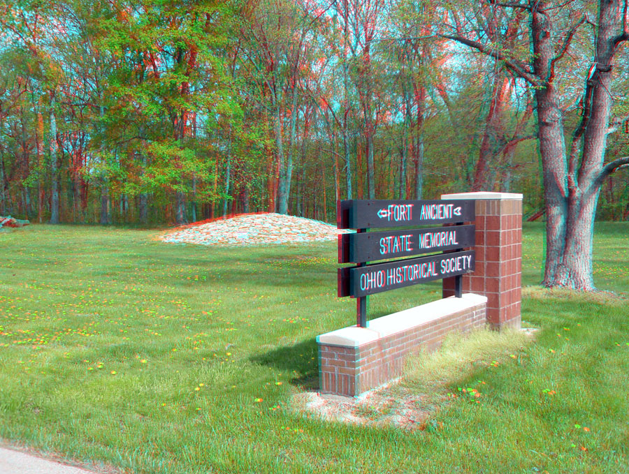 Greeting sign and stone-covered mound in Fort Ancient Memorial Park