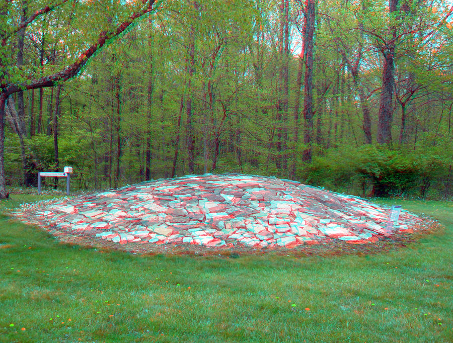 Stone covered earthen mound in Fort Ancient Memorial Park