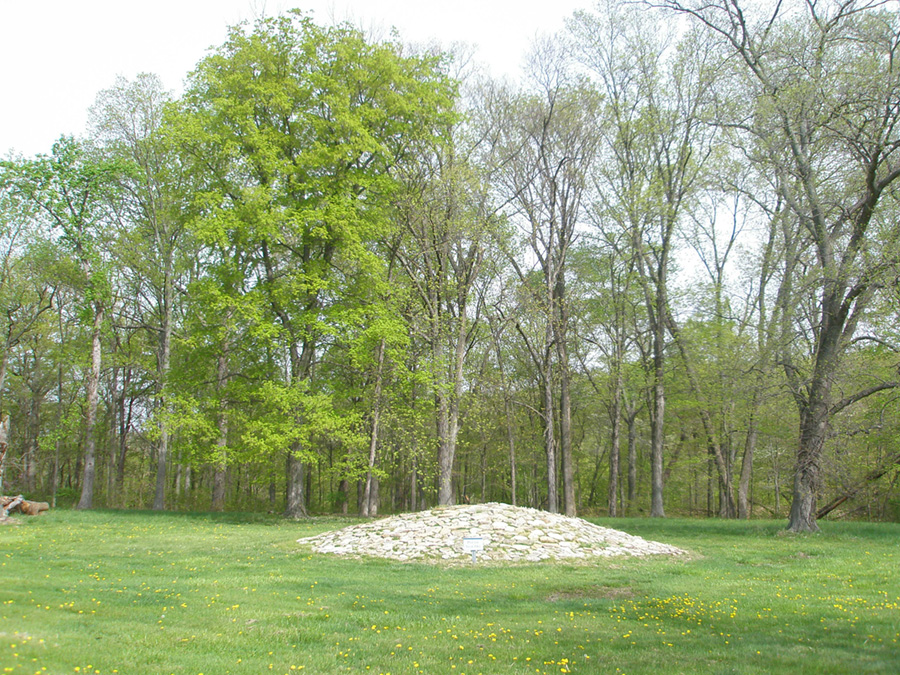 A stone-covered mound in Fort Ancient Memorial Park