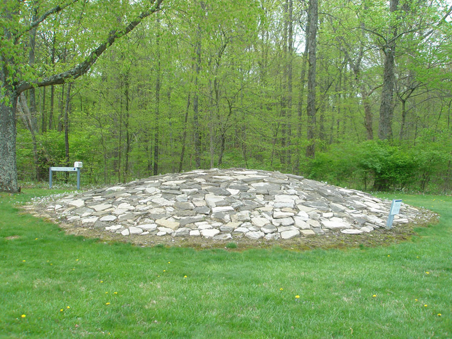Stone covered earthen mound in Fort Ancient Memorial Park