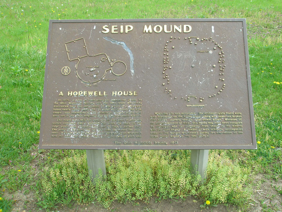 View of a park desplay sign describing the ancient Hopewell House at the Seip Mound site.