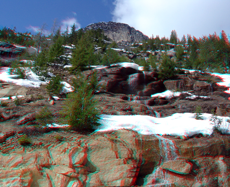 Melting snow and cascades on granite along the North Cascades Highway