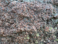 Close-up view of the coarse crystalline granite in a glacial erratic in Pipestone National Monument.