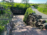 Entrance to one of the small historic quarries along the loop trail from the Visitor Center.