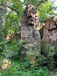 A pinnacle of Souix Quartzite in the woods along the loop trail from the Visitor Center.