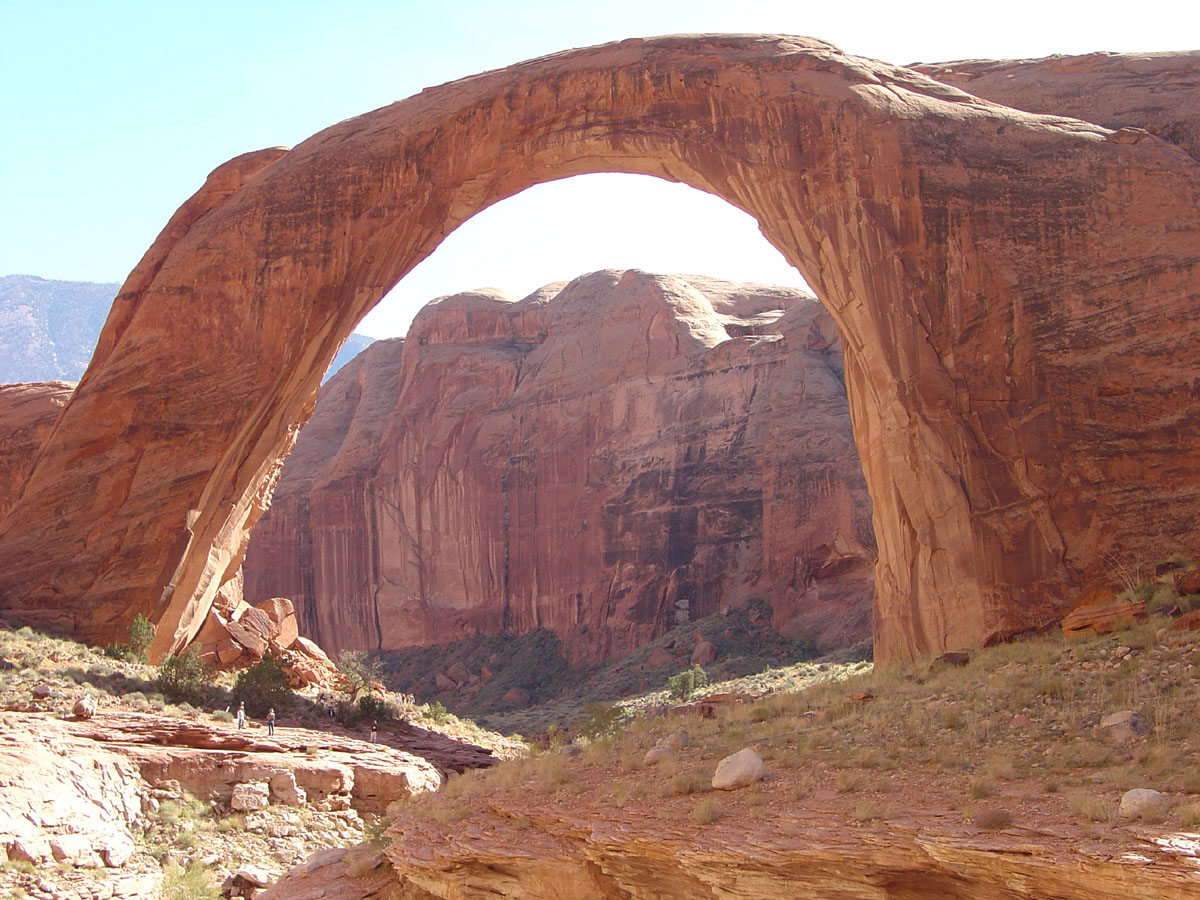 View looking south at Rainbow Bridge and Navajo Mountain in the distance. 