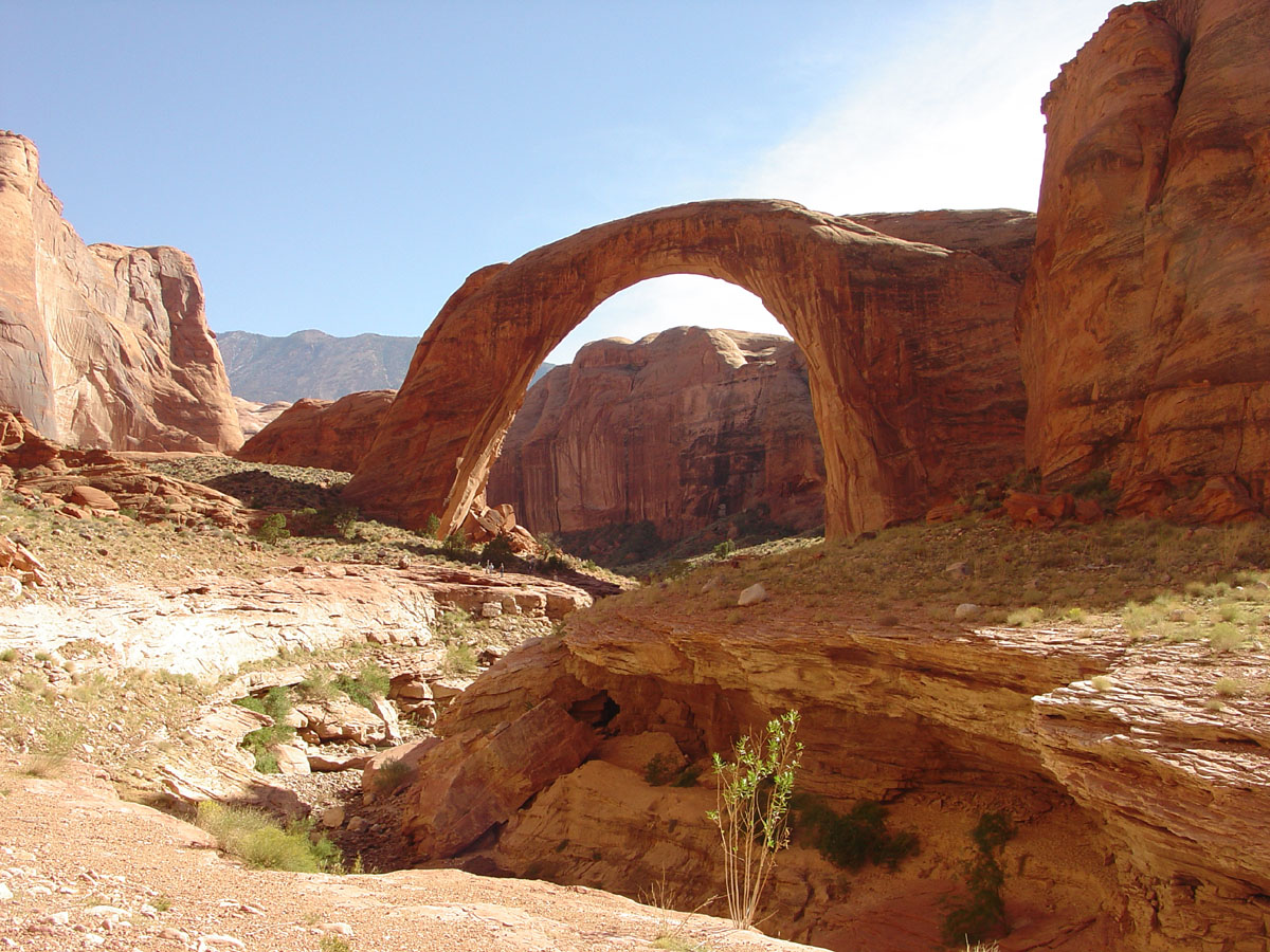 View looking south at Rainbow Bridge and Navajo Mountain in the distance. 