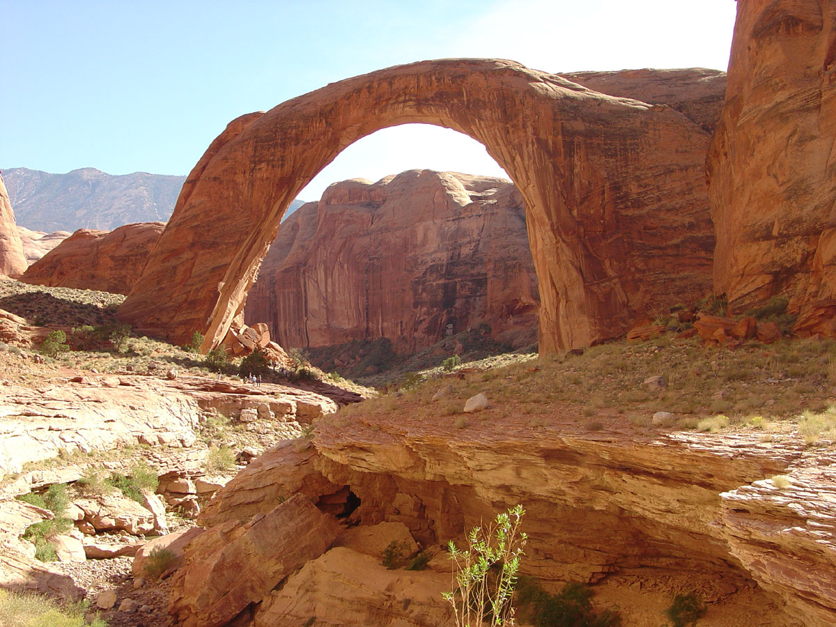 View looking south at Rainbow Bridge and Navajo Mountain in the distance. 