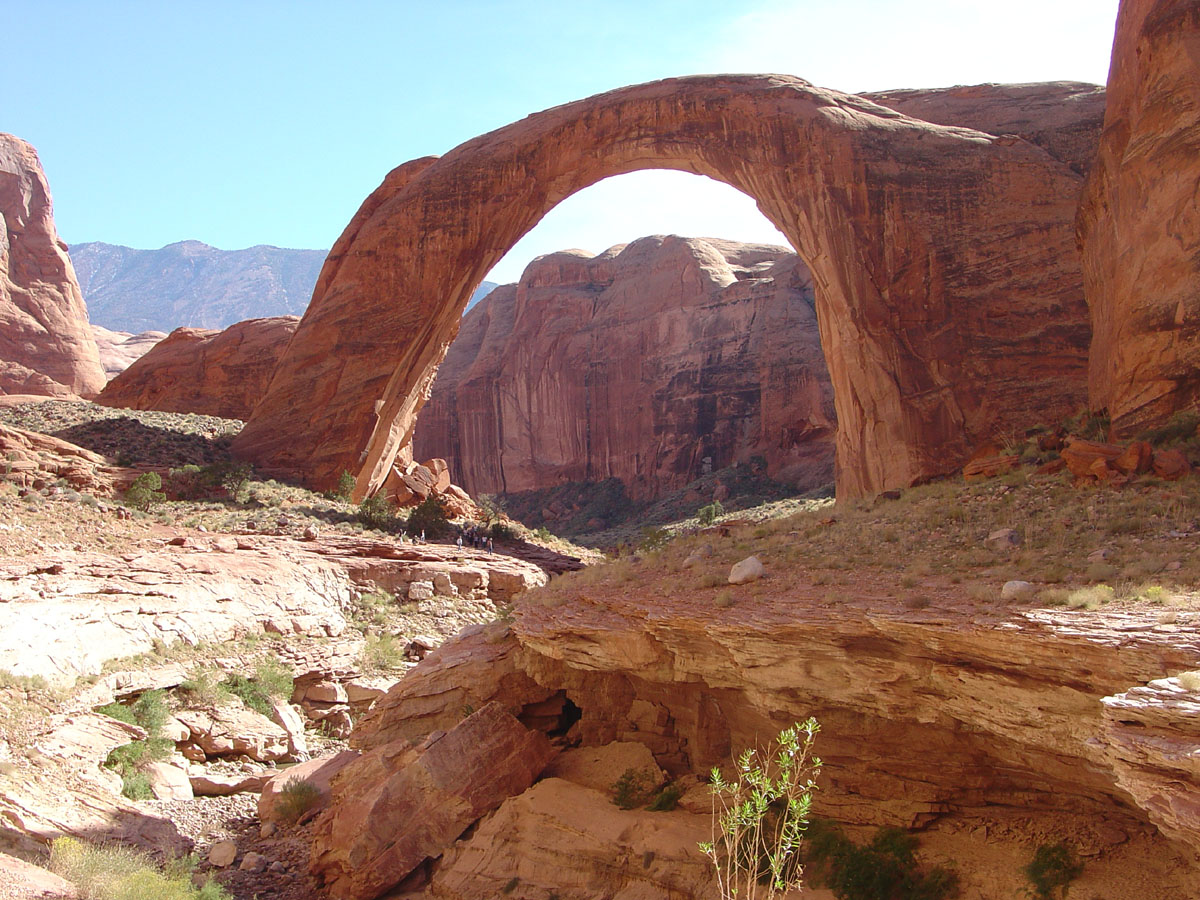 View looking south at Rainbow Bridge and Navajo Mountain in the distance. 