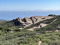 View south of rock formations and Channel Islands overlook area on Piuma Road.