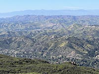 View north toward ridgelines in the Transverse Ranges from overlook area on Piuma Road.