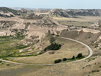 Zoomed-in view of the park road leading to the first of three tunnels on the road leading to the top of Scotts Bluff.