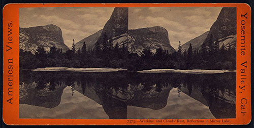 Stereo showing reflection of mountains on a lake.