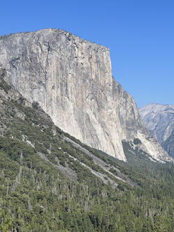 El Capitan cliffs with talus slope in foreground.